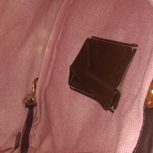 Dooney & Bourke Brown Suede Interior with Pink Accent Plaque